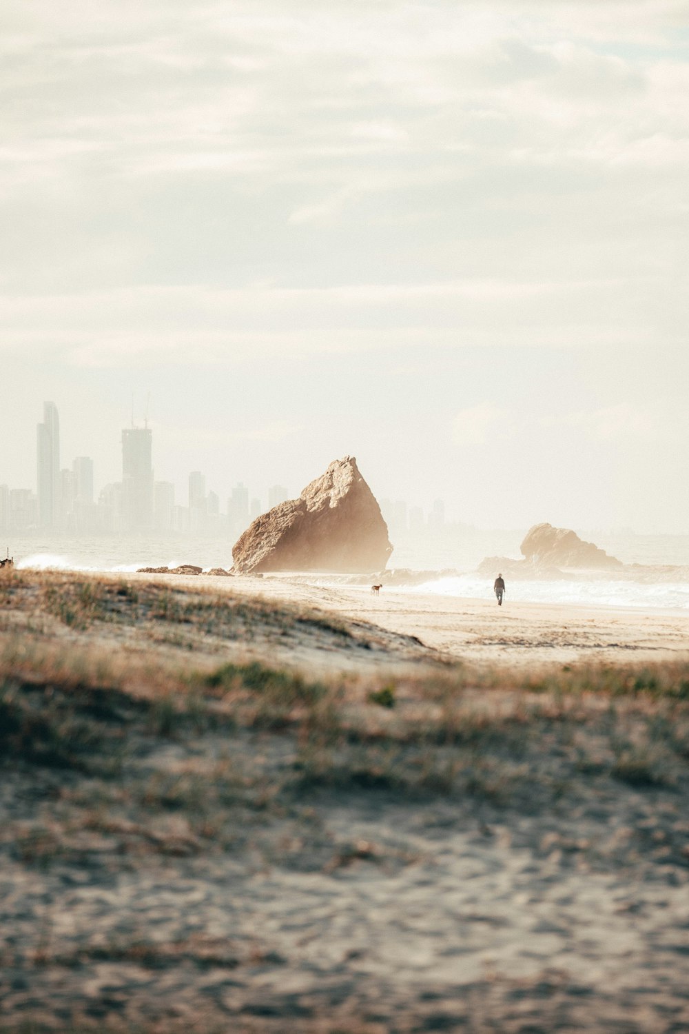 brown rock formation on brown sand during daytime