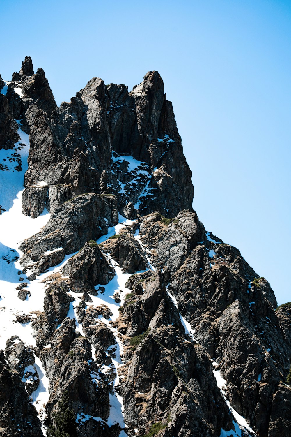 snow covered mountain during daytime