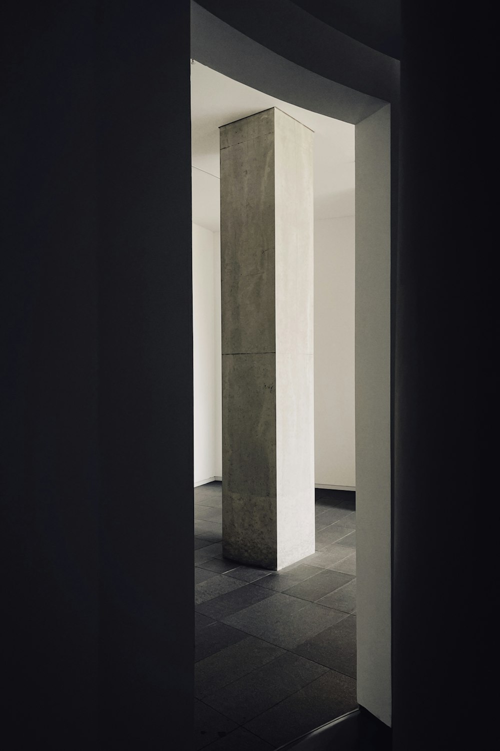 white and gray tiled hallway