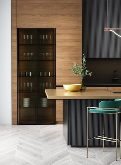 brown wooden cabinet near green and white table