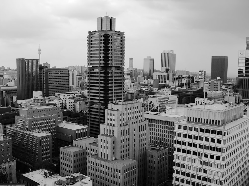 grayscale photo of city buildings