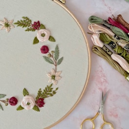 round white and brown floral ceramic plate