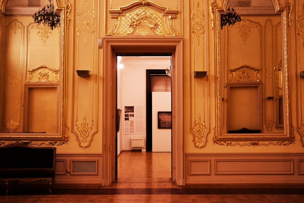 brown wooden door with gold door lever