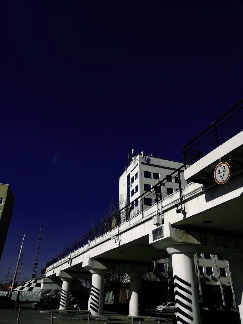 white concrete building under blue sky during daytime