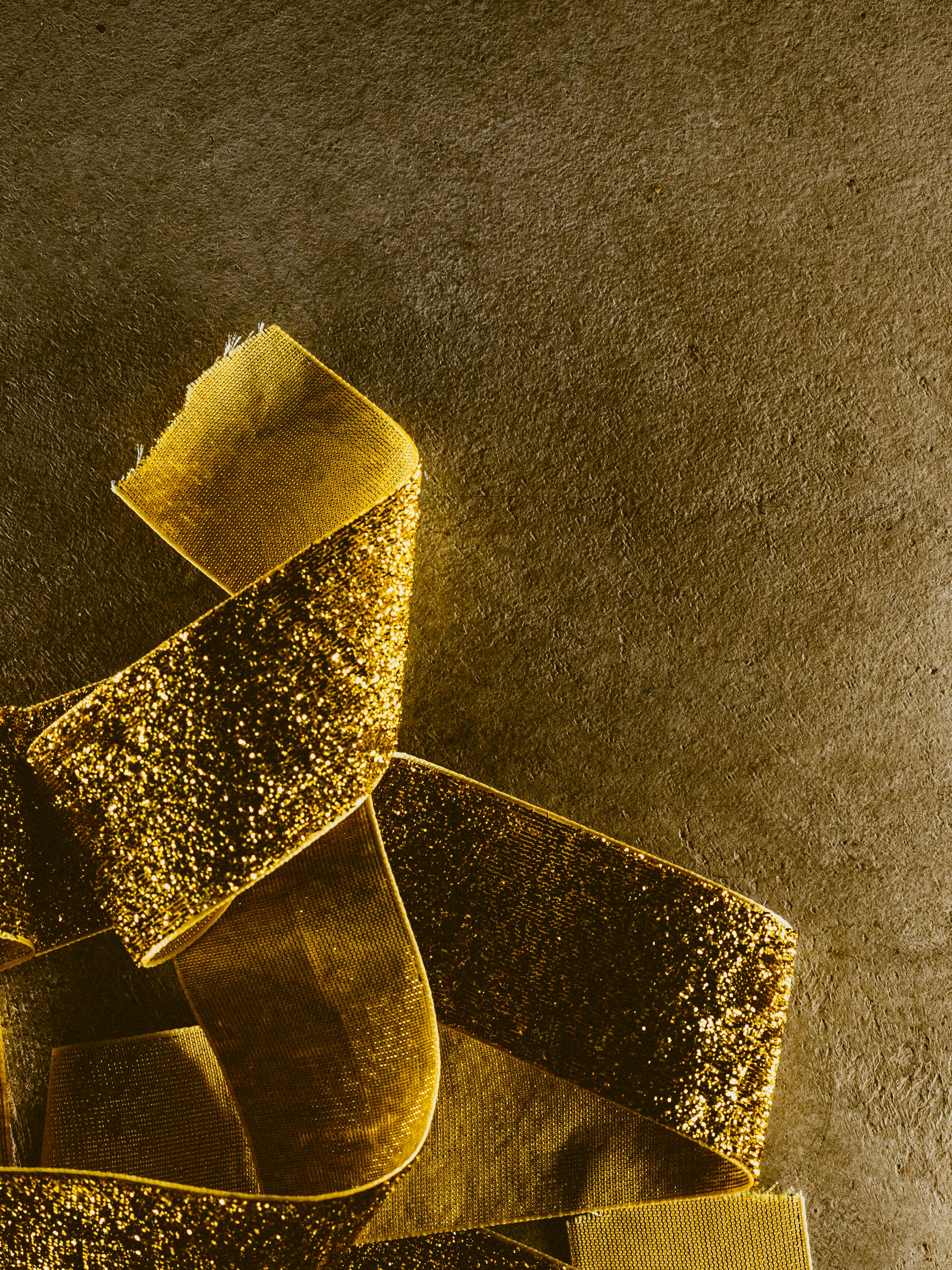 Golden ribbon on a textured background