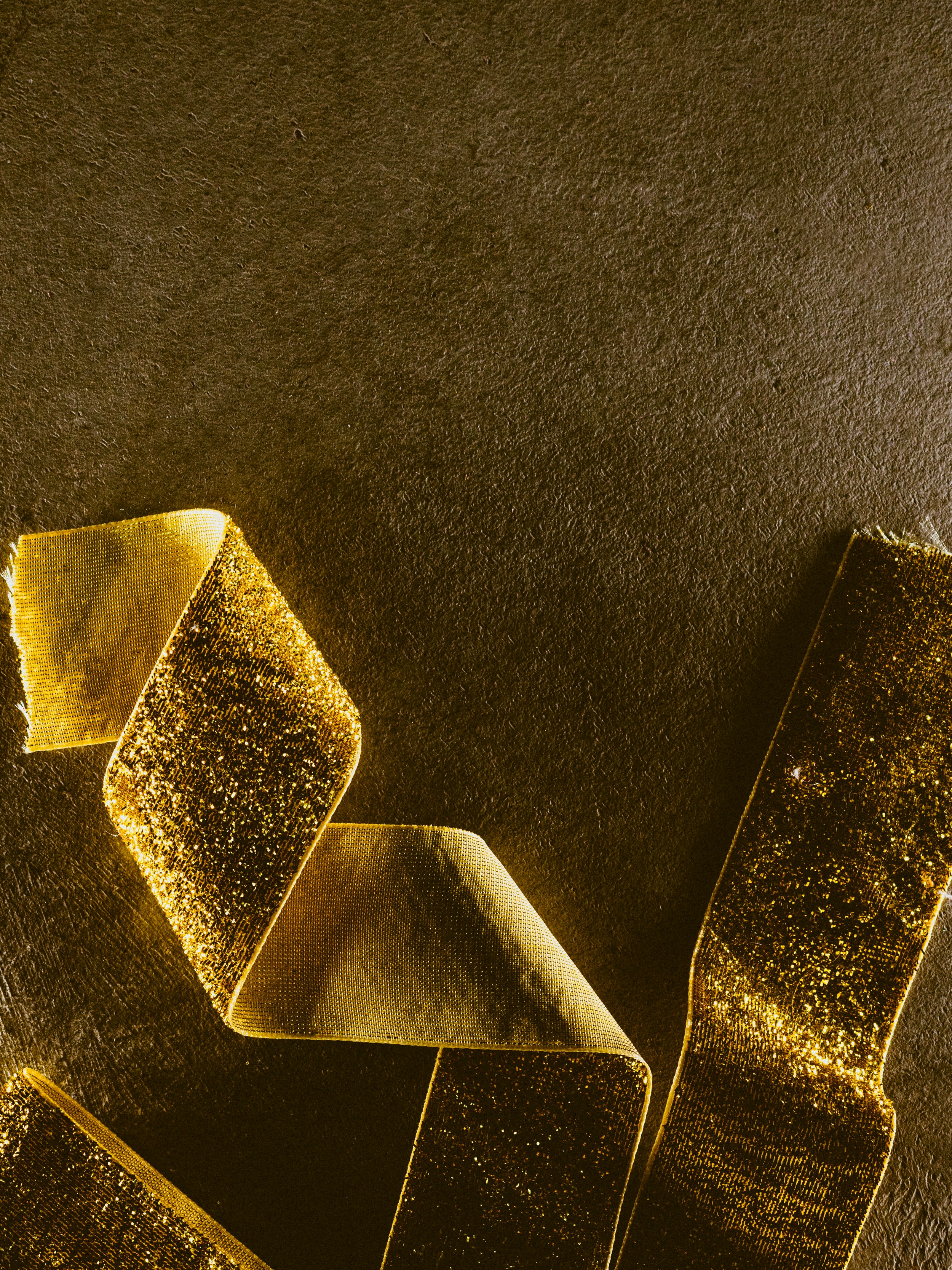 Golden ribbon on a textured background