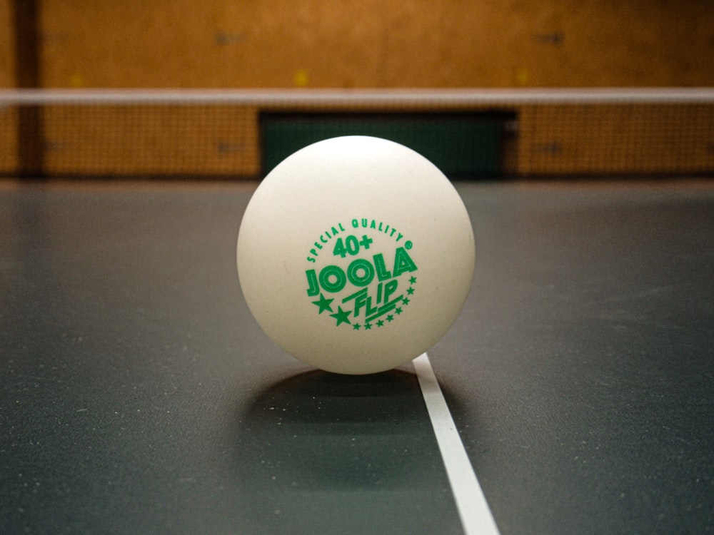 a ping pong ball sitting on top of a table