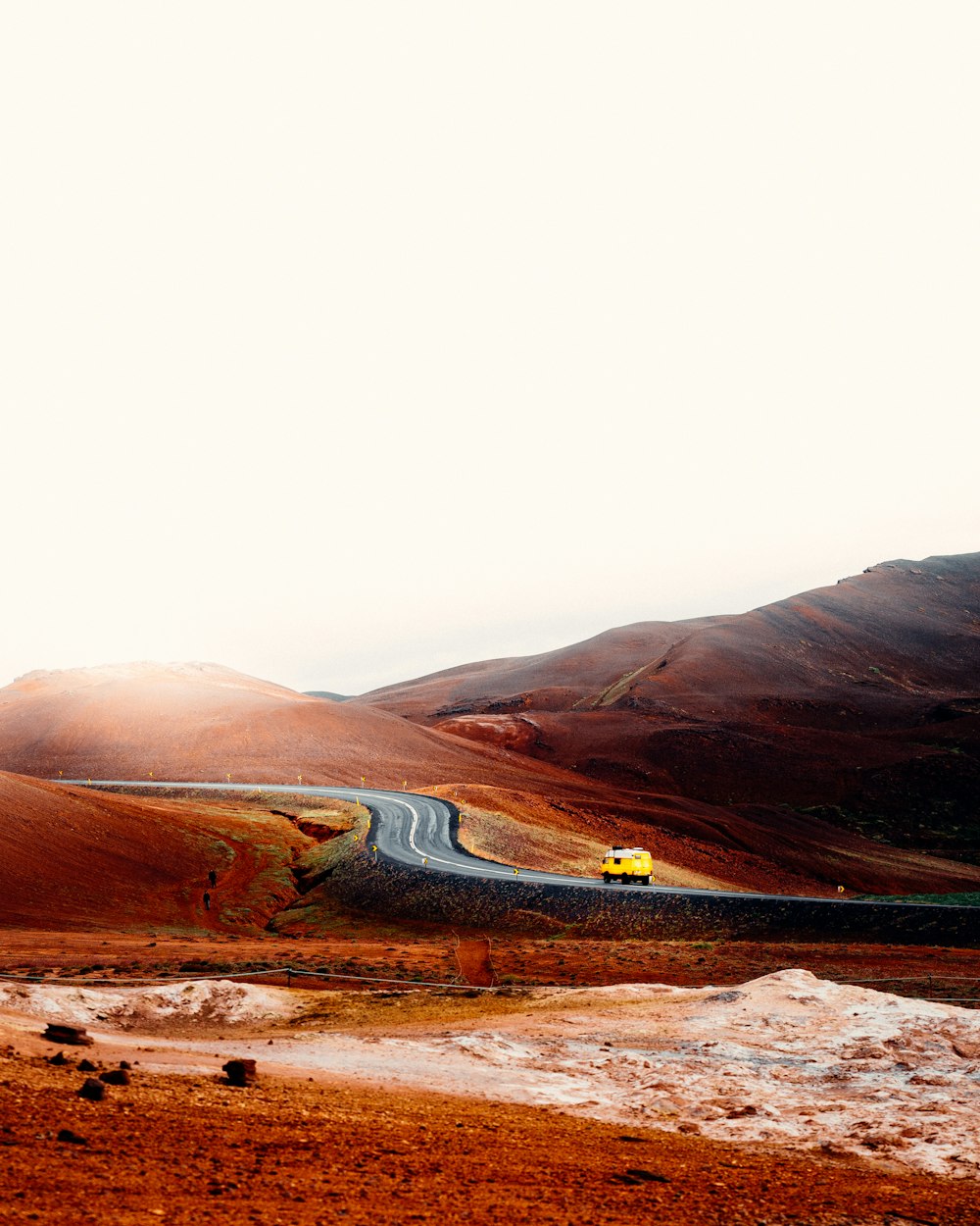 brown mountains near road during daytime