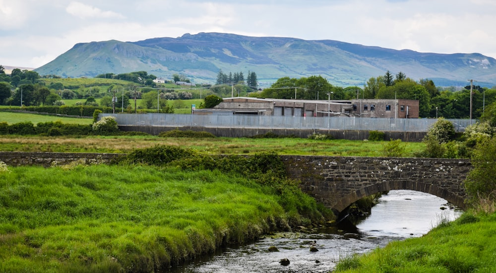 gray concrete bridge over river