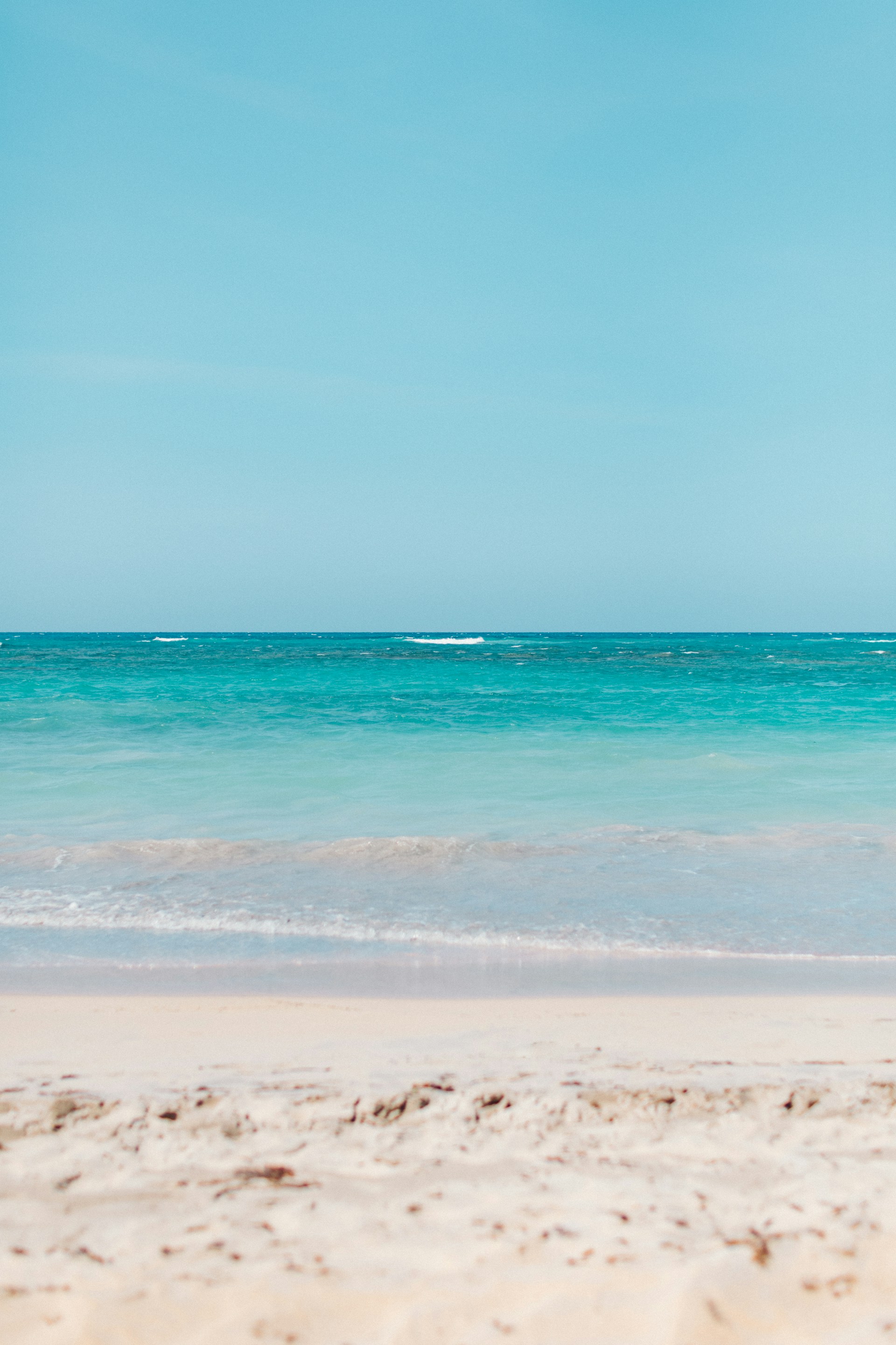 blue sea under blue sky during daytime
