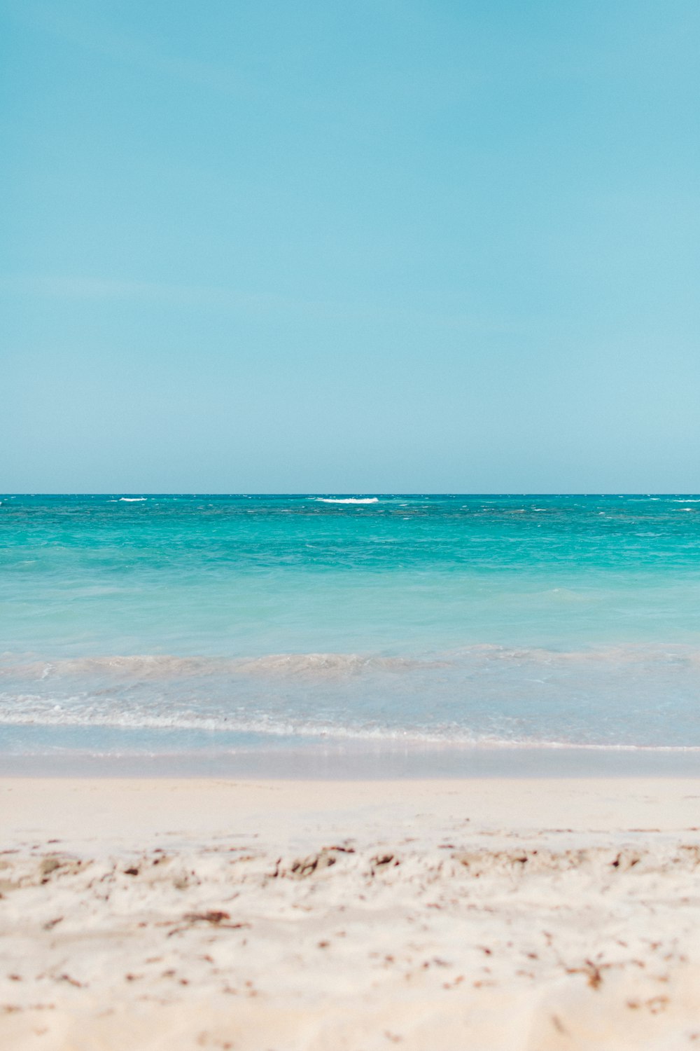 blue sea under blue sky during daytime