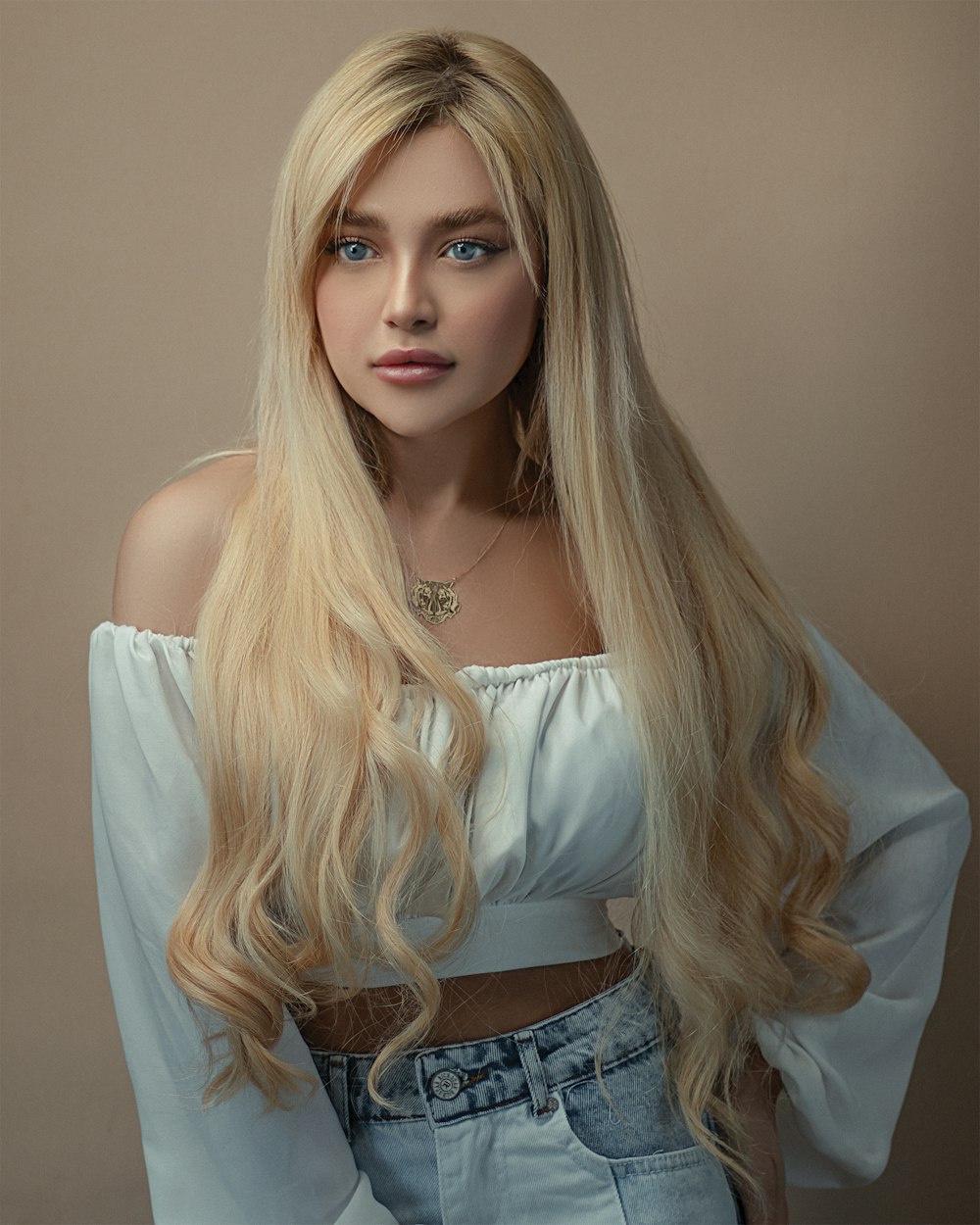 woman in white tank top and blue denim bottoms