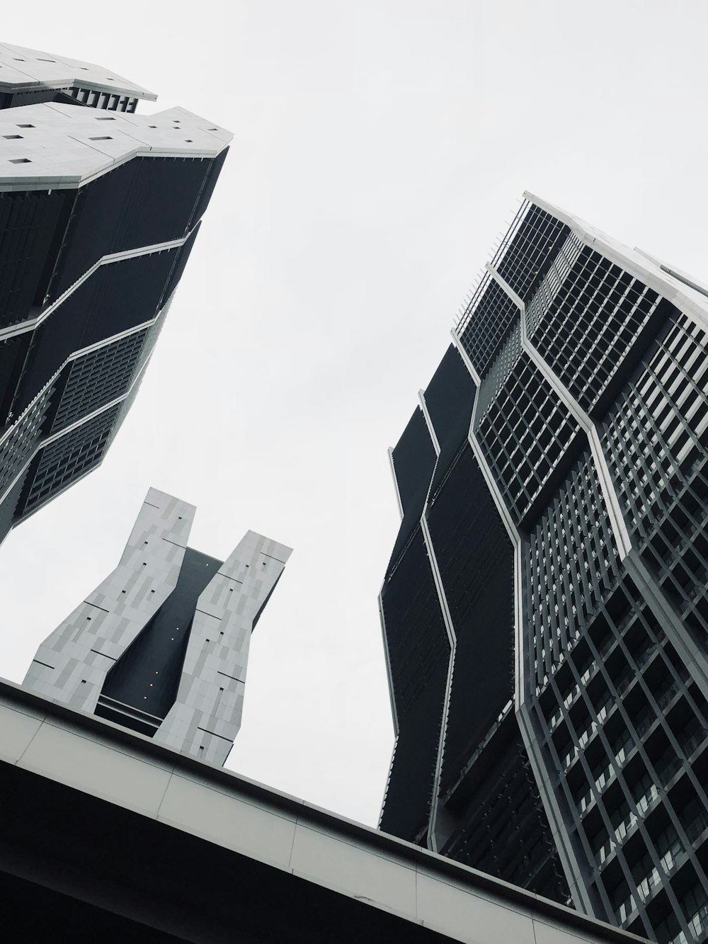 low angle photography of high rise buildings