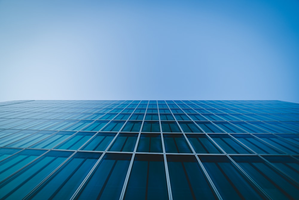 black and white glass walled high rise building