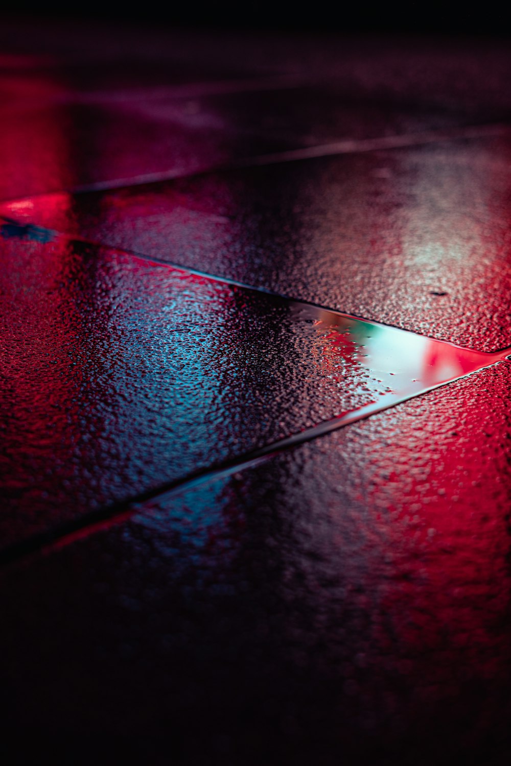 red light on black surface