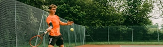 woman in black tank top playing tennis during daytime