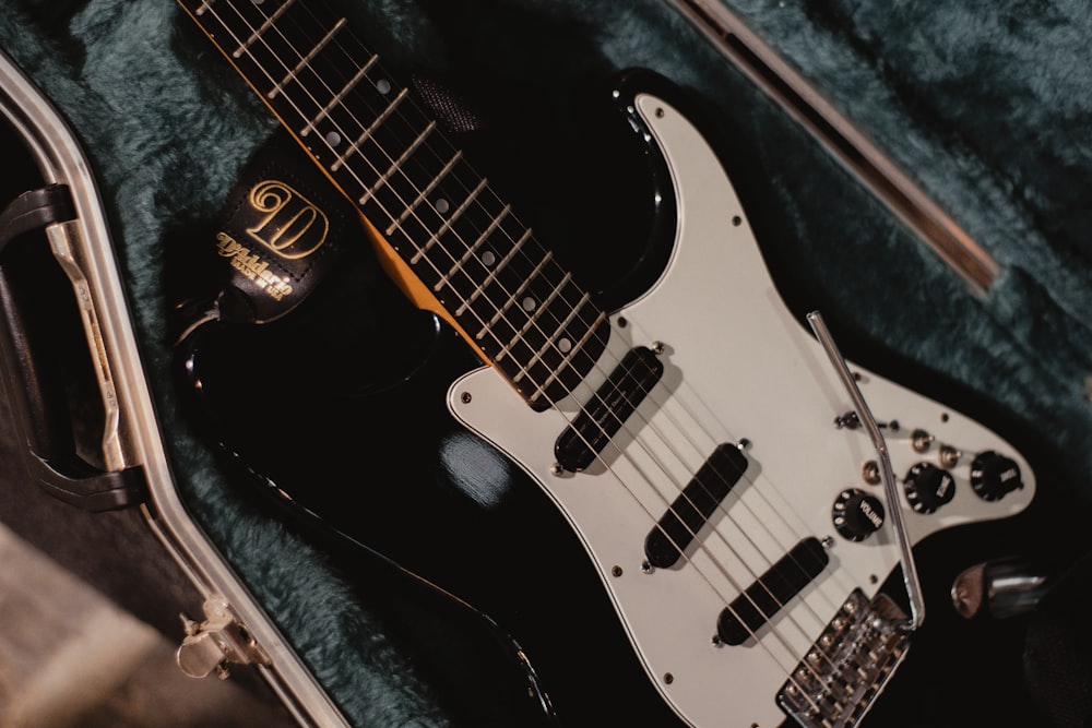 black and white stratocaster electric guitar