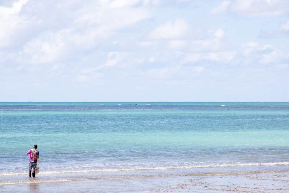 blue sea under white clouds during daytime