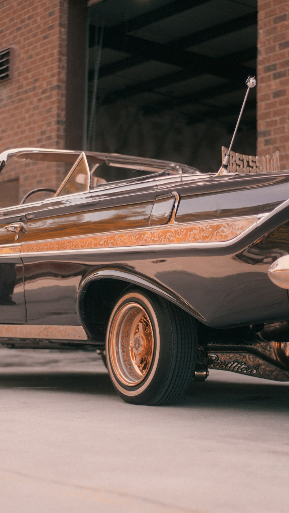 white and brown vintage car