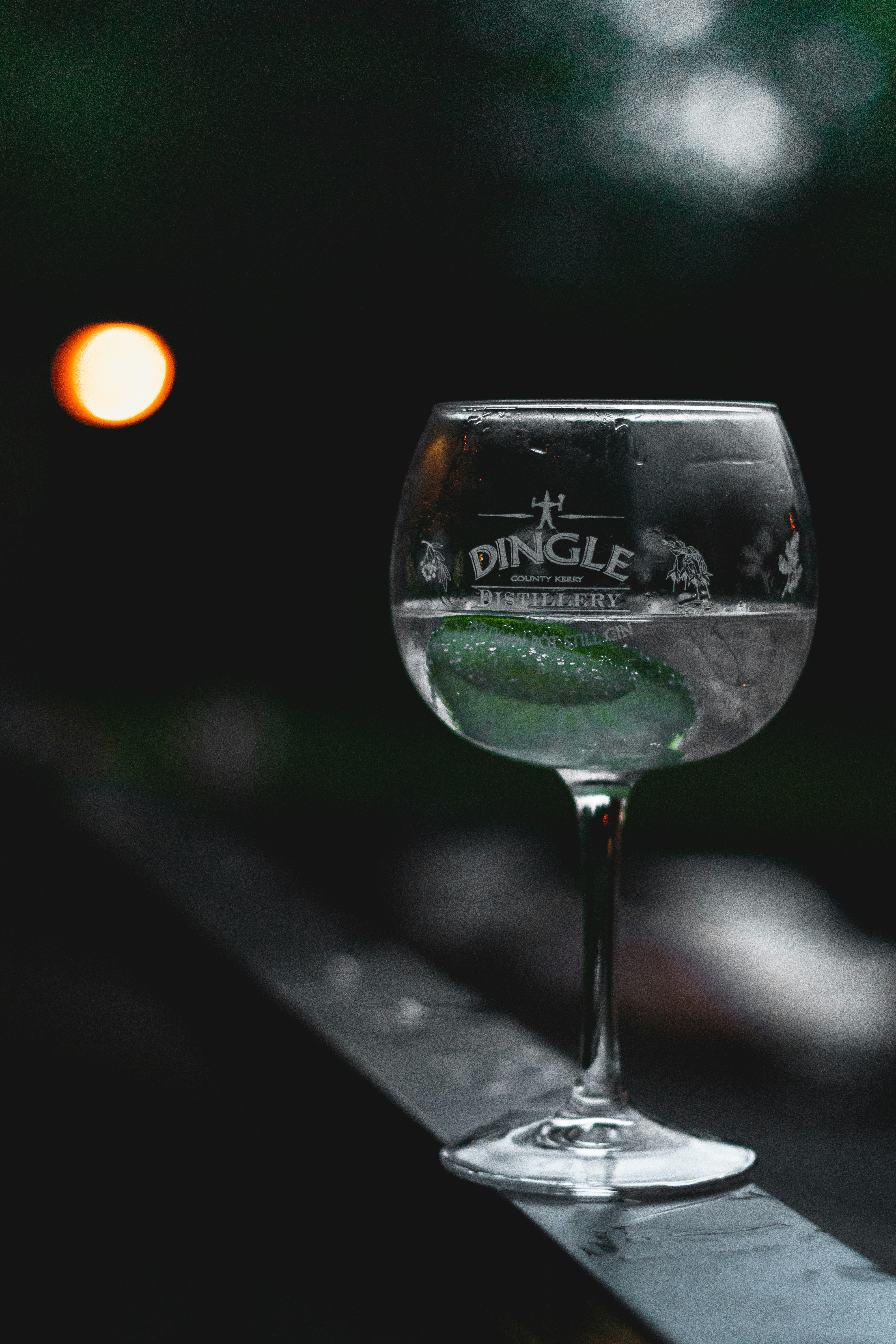 clear wine glass with green liquid