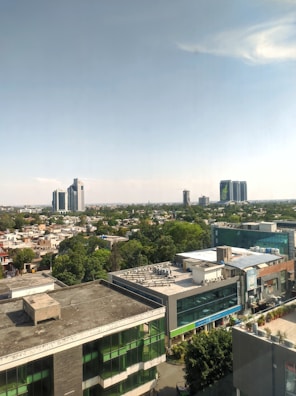 A city skyline featuring smart buildings and greenery.