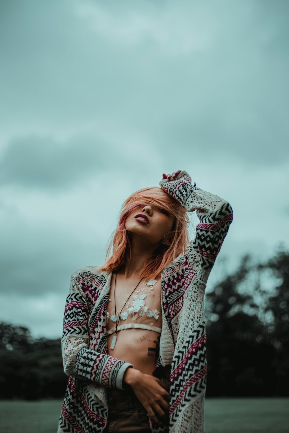 woman in white and black cardigan