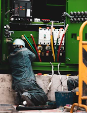 person in blue denim jeans and white helmet