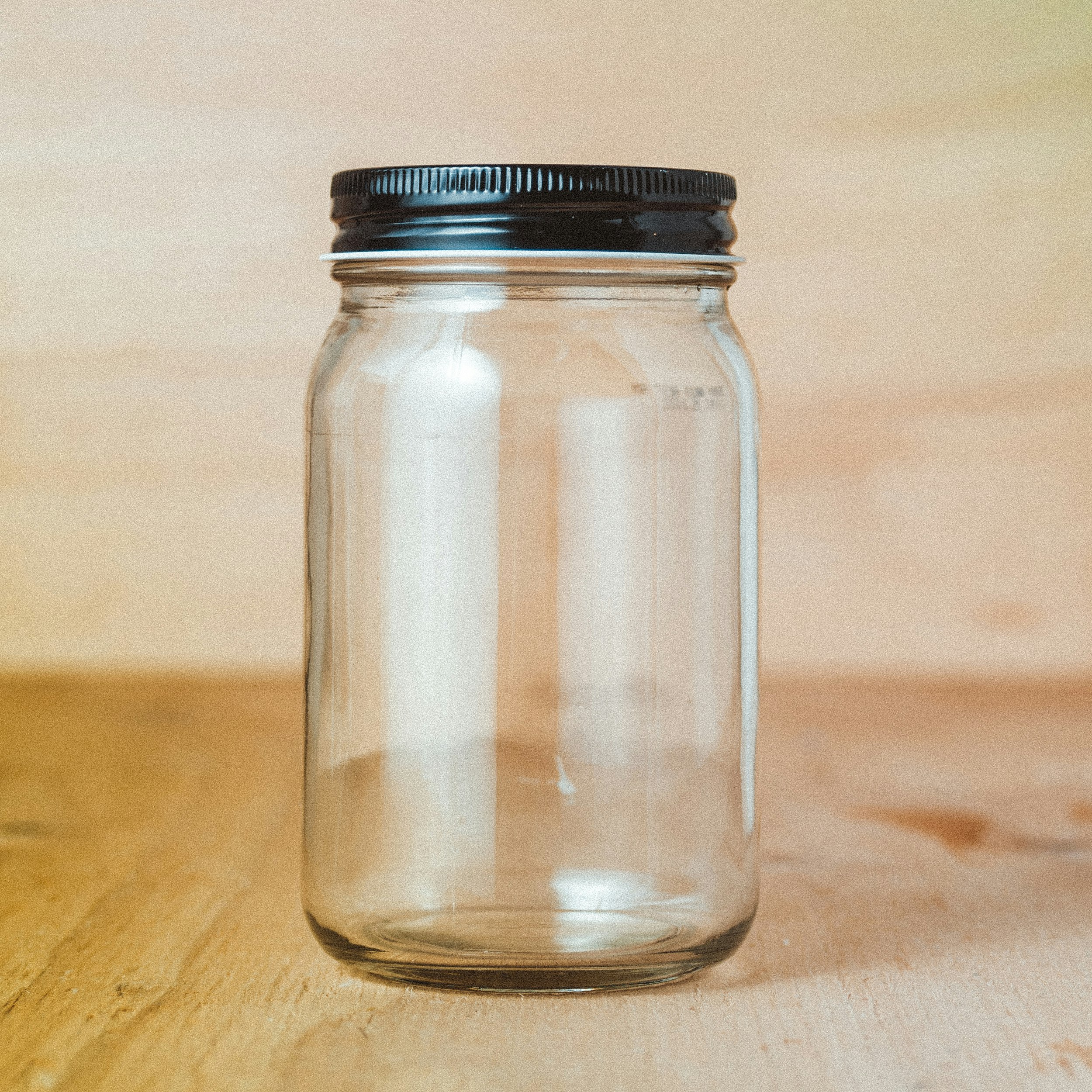 The simplicity of an empty jar with lid. 