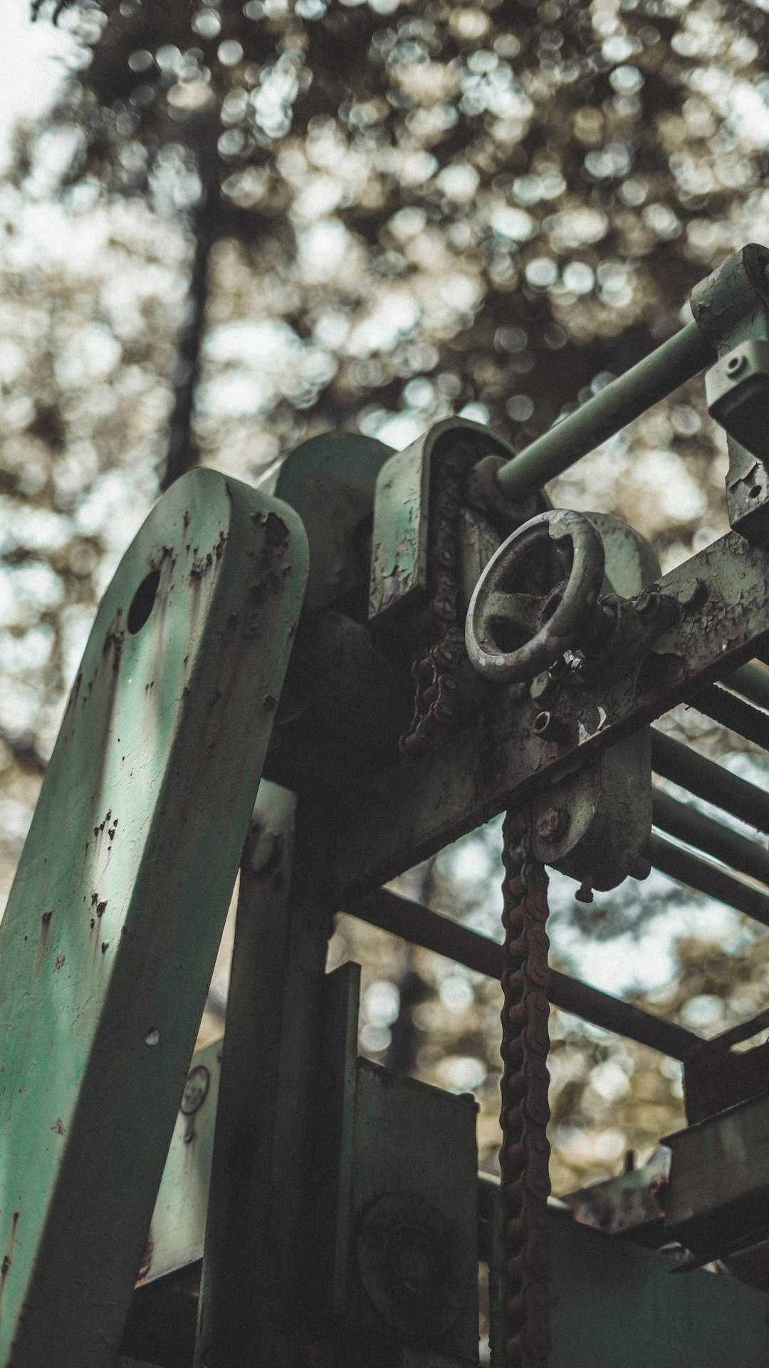 green metal pipe with padlock