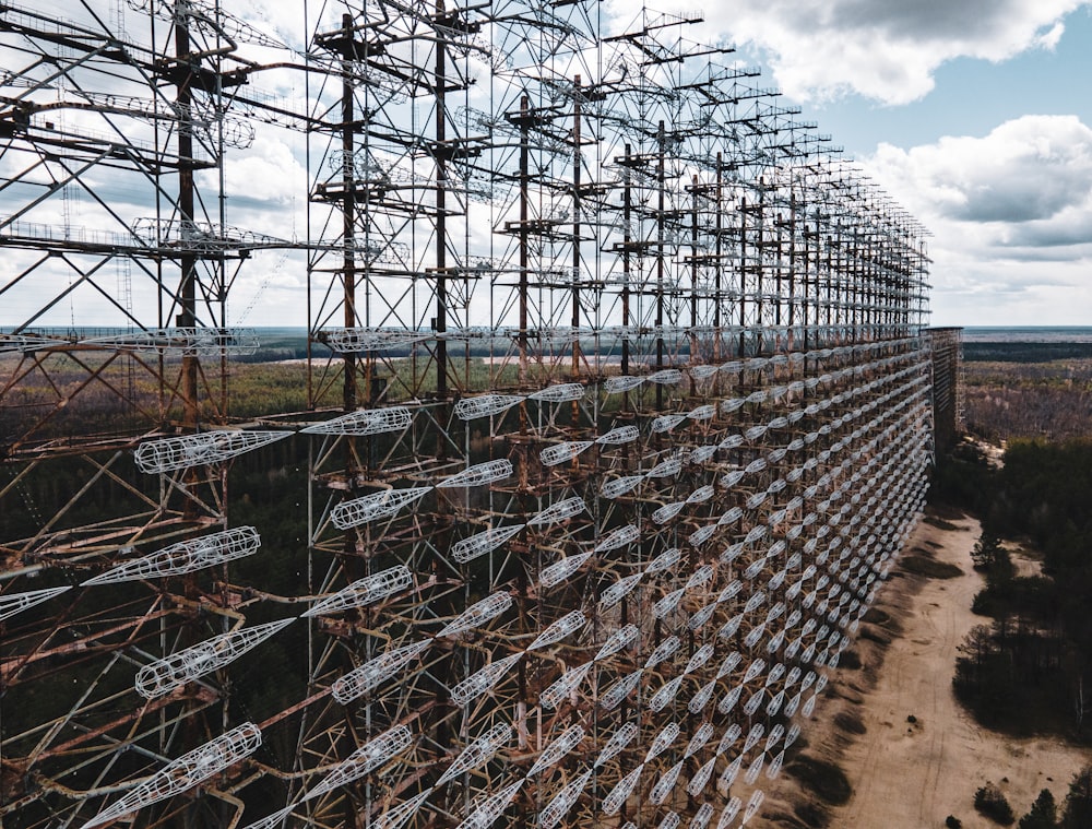 gray metal fence near body of water during daytime