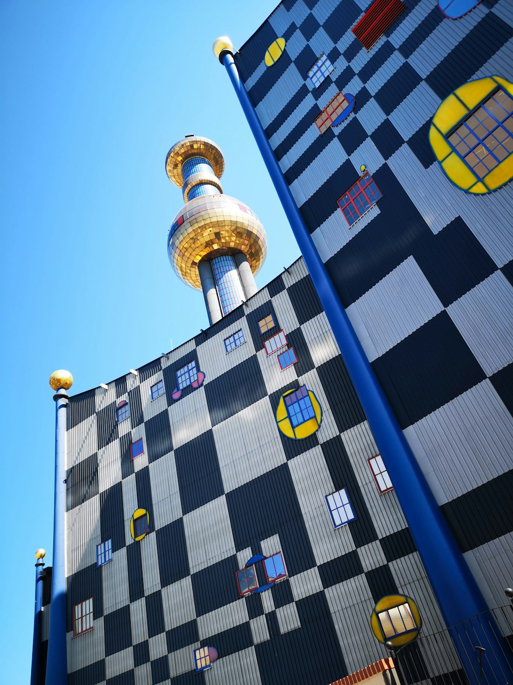 blue and yellow building under blue sky during daytime