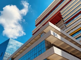 white concrete building under blue sky during daytime