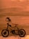 A small, decorative metal bicycle with a wooden seat is positioned against a smooth, wooden background. The bicycle features two cylindrical handles and a classic design with visible pedal gears.