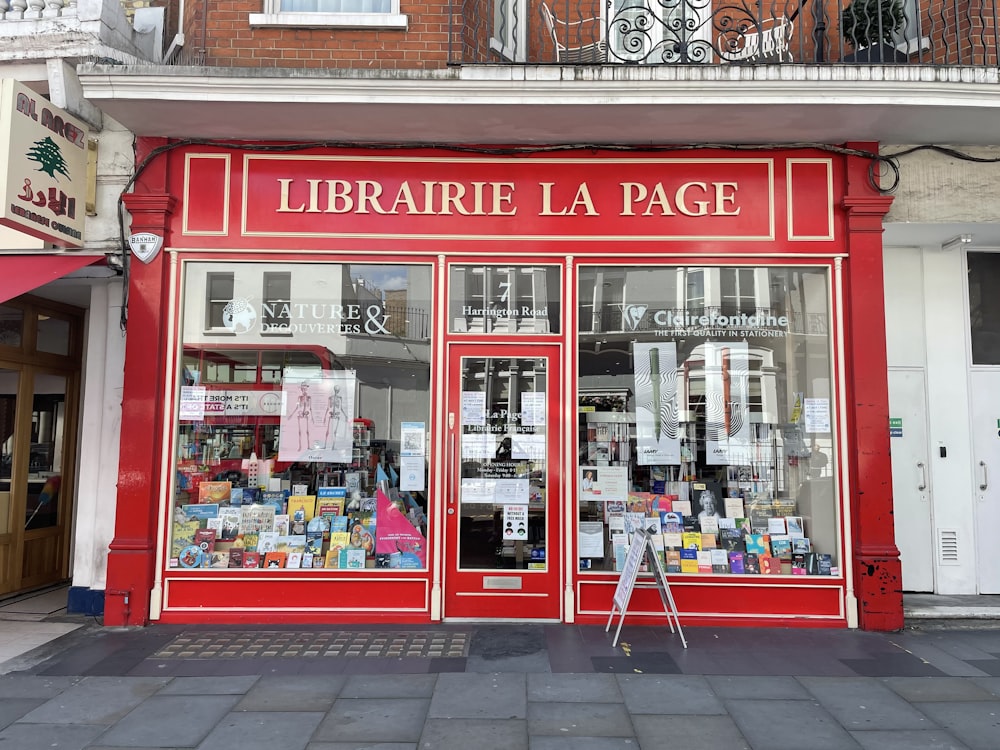 red and white store front during daytime