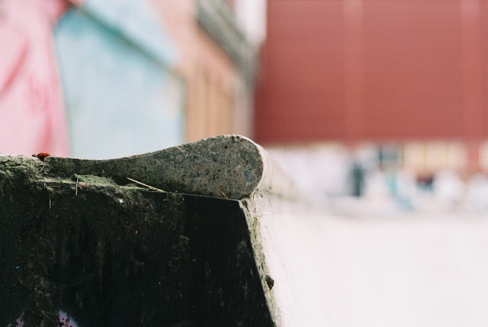 black wooden handle on white concrete wall