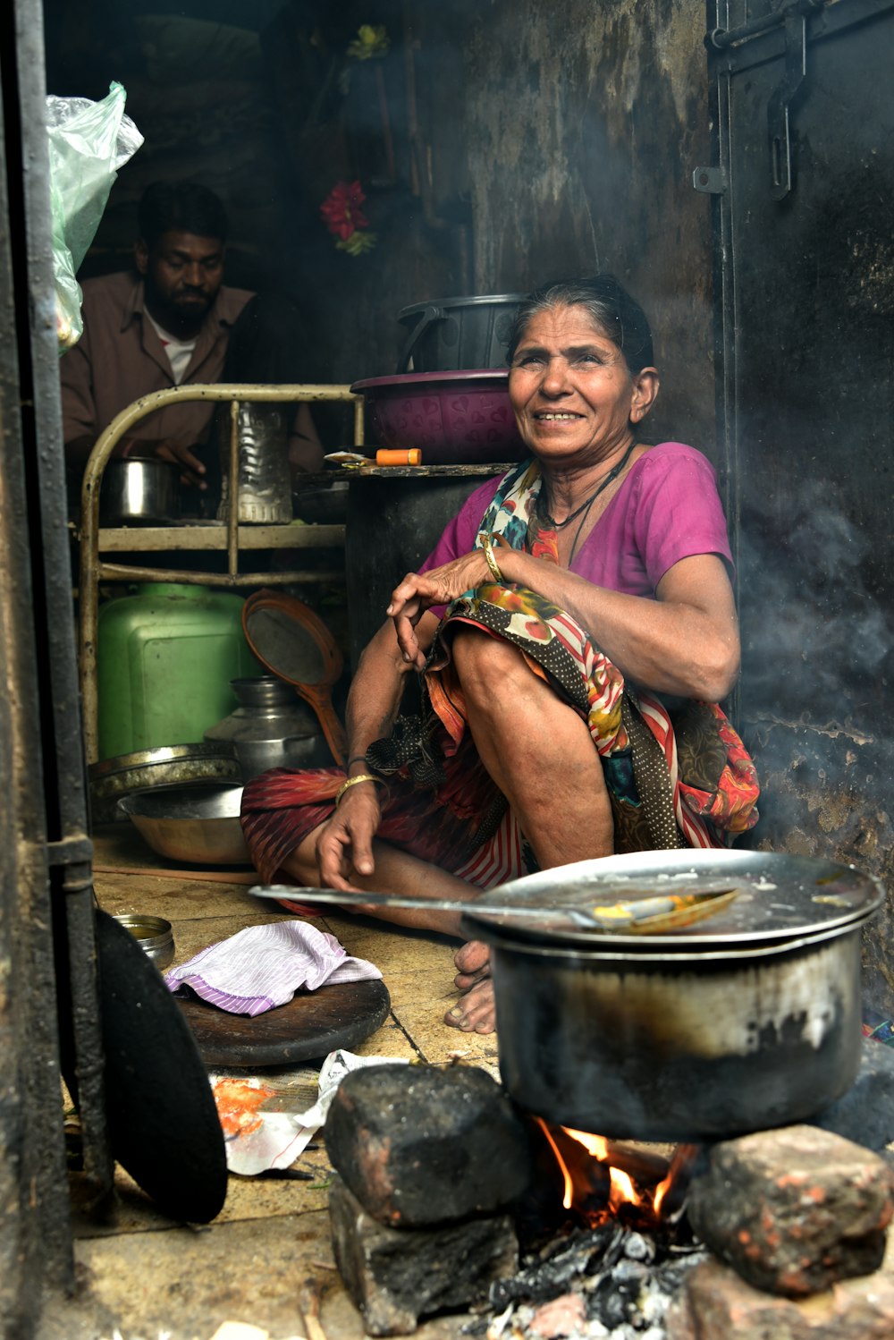 woman in purple shirt cooking