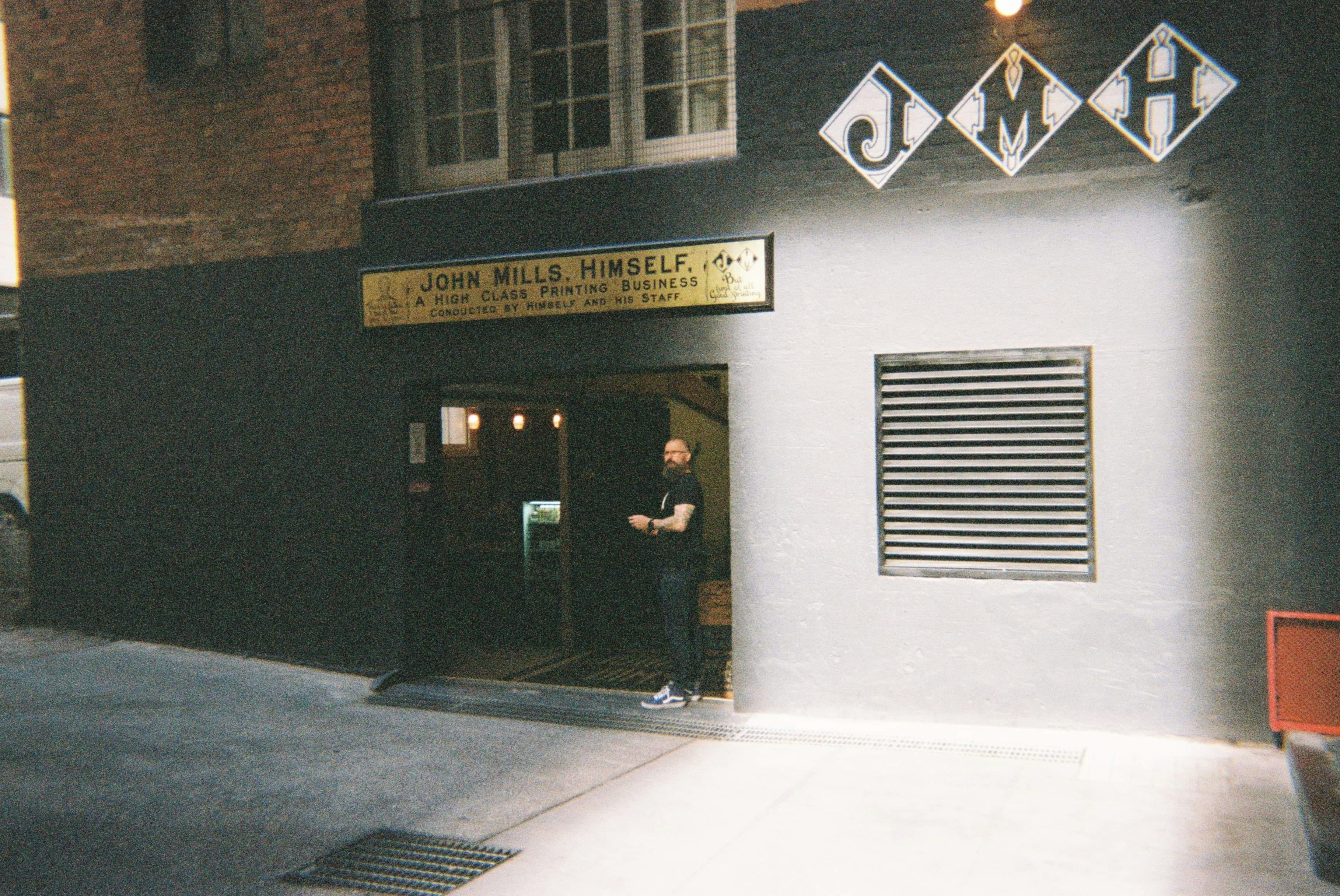 brown and white concrete building, Fav cafe John Mills himself 