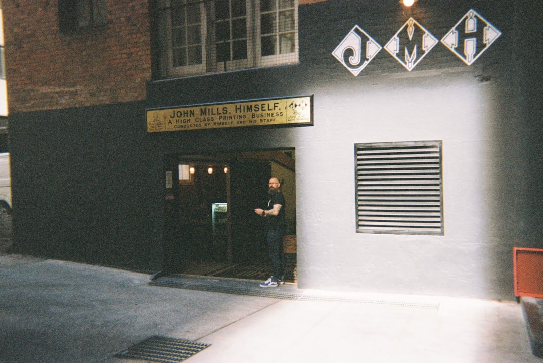 brown and white concrete building, Fav cafe John Mills himself