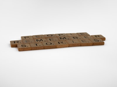 brown wooden blocks on white surface narrative zoom background