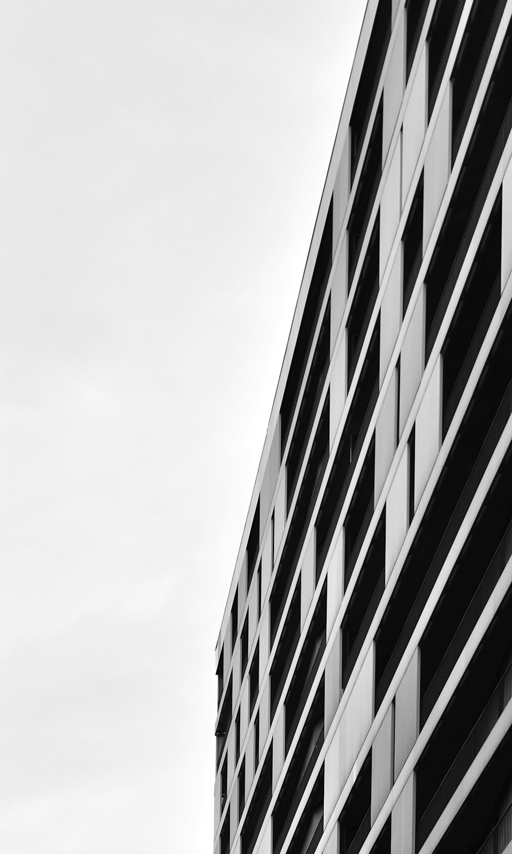 grayscale photo of concrete building