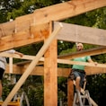 wood framing a roof.