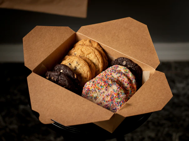 A box of assorted gourmet cookies ready for delivery.