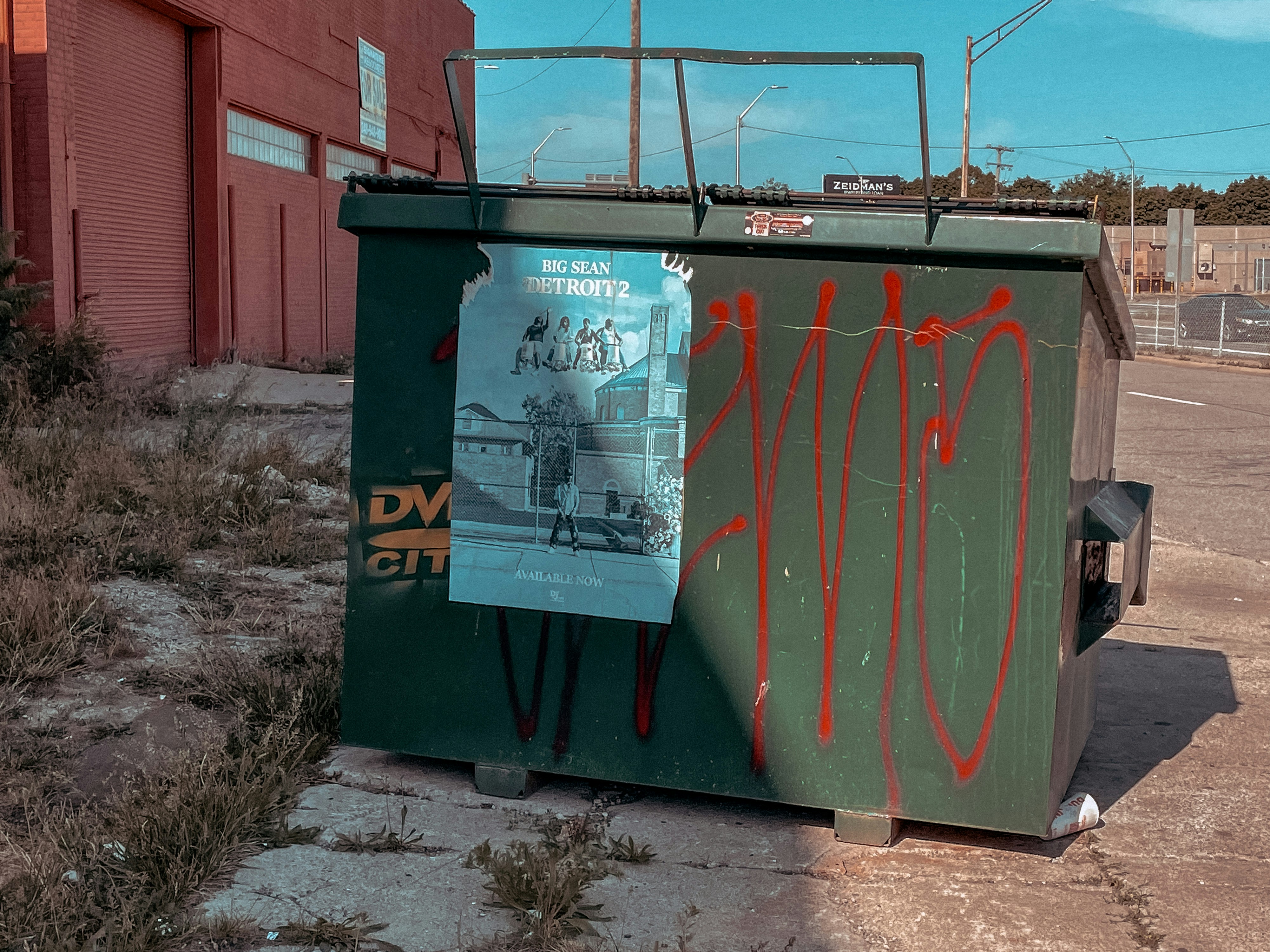 red and black trash bin