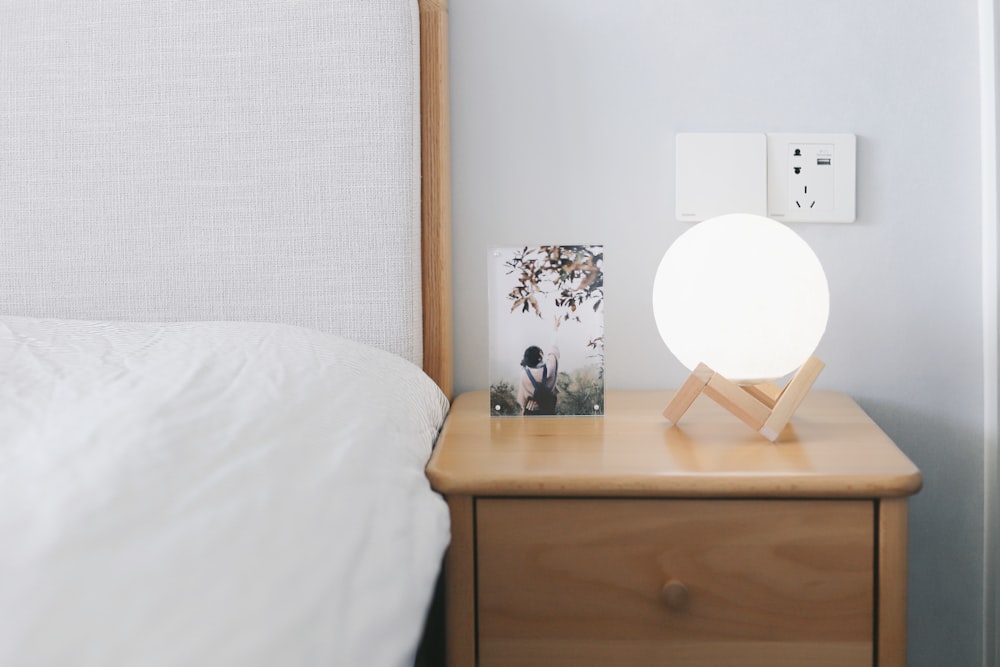 white and brown wooden desk with mirror