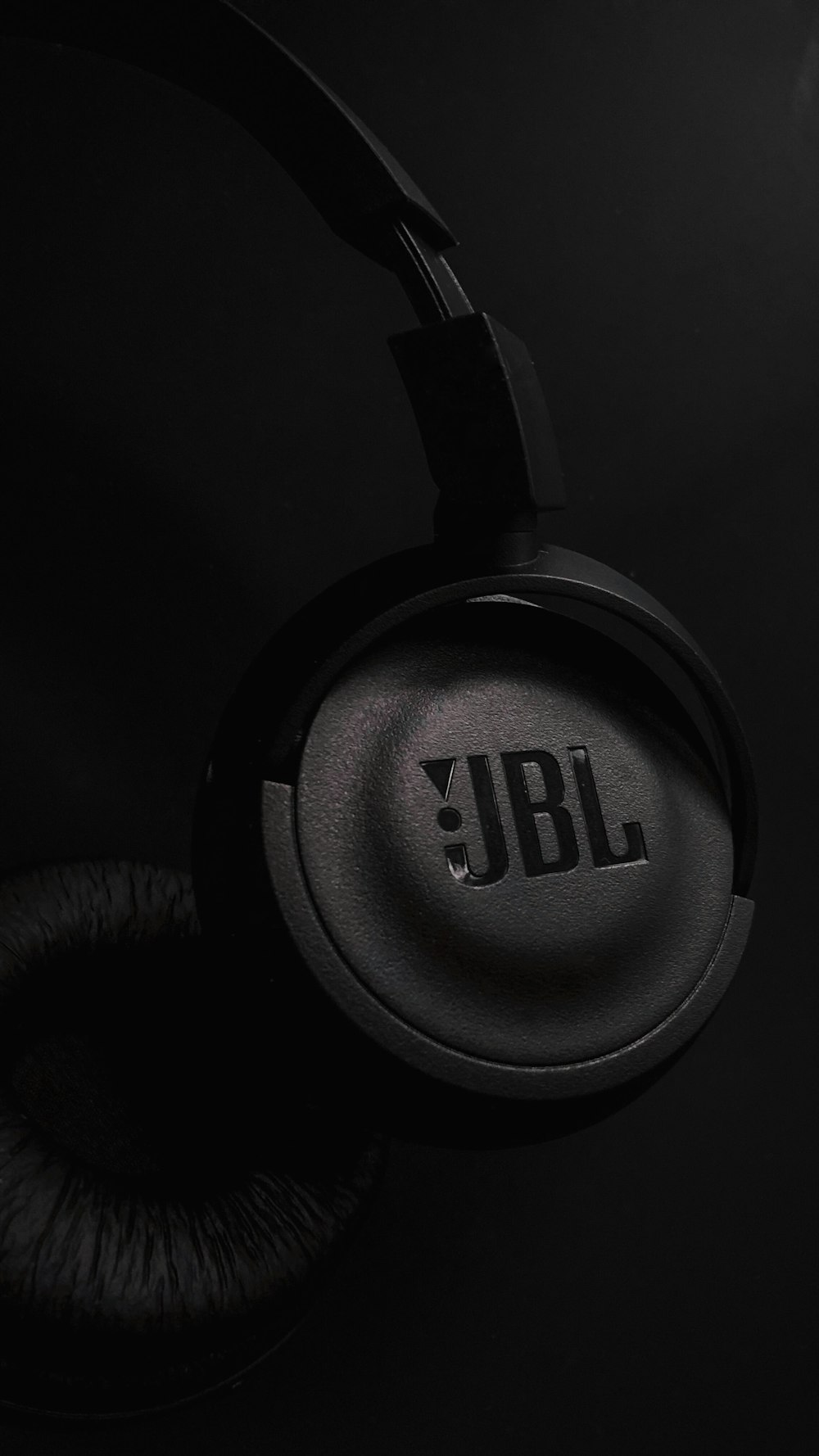a pair of headphones with the jbl logo on it