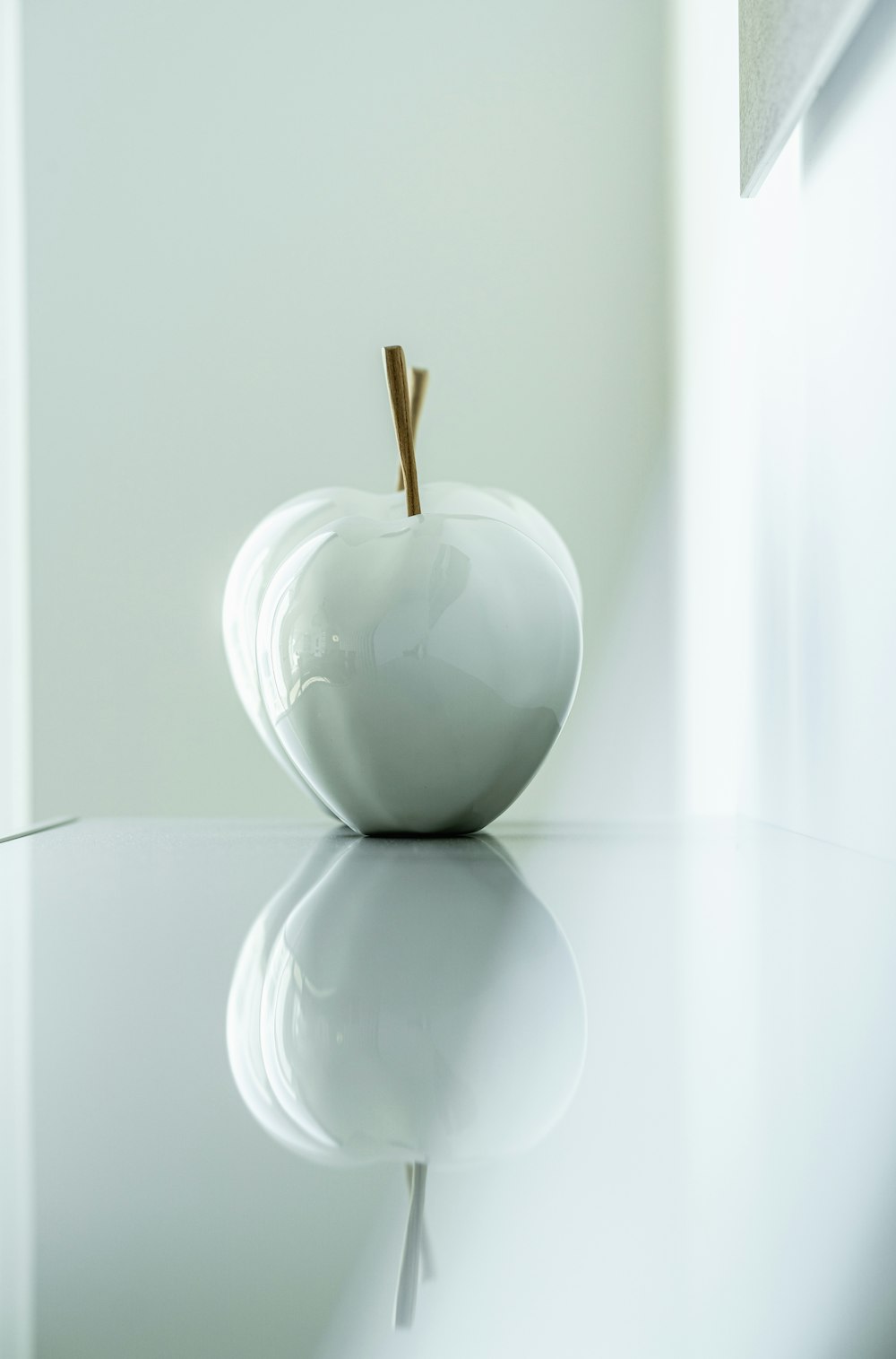 white egg on white ceramic bowl