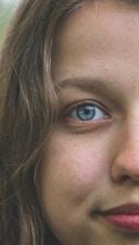 woman with blue eyes and brown hair