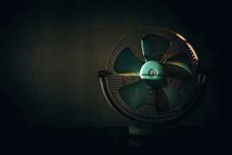 black and green desk fan