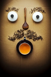 white egg beside brown wooden spoon