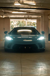 black porsche 911 parked in garage